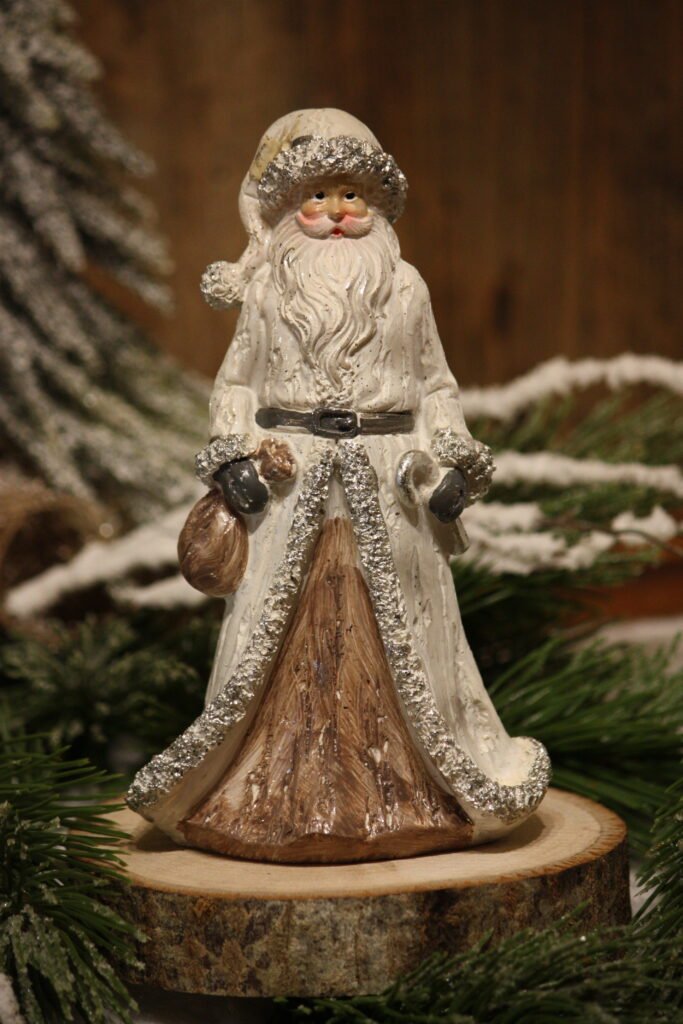 Personnage de Noël – Le Père Noël avec sa besace et un sucre d&rsquo;orge